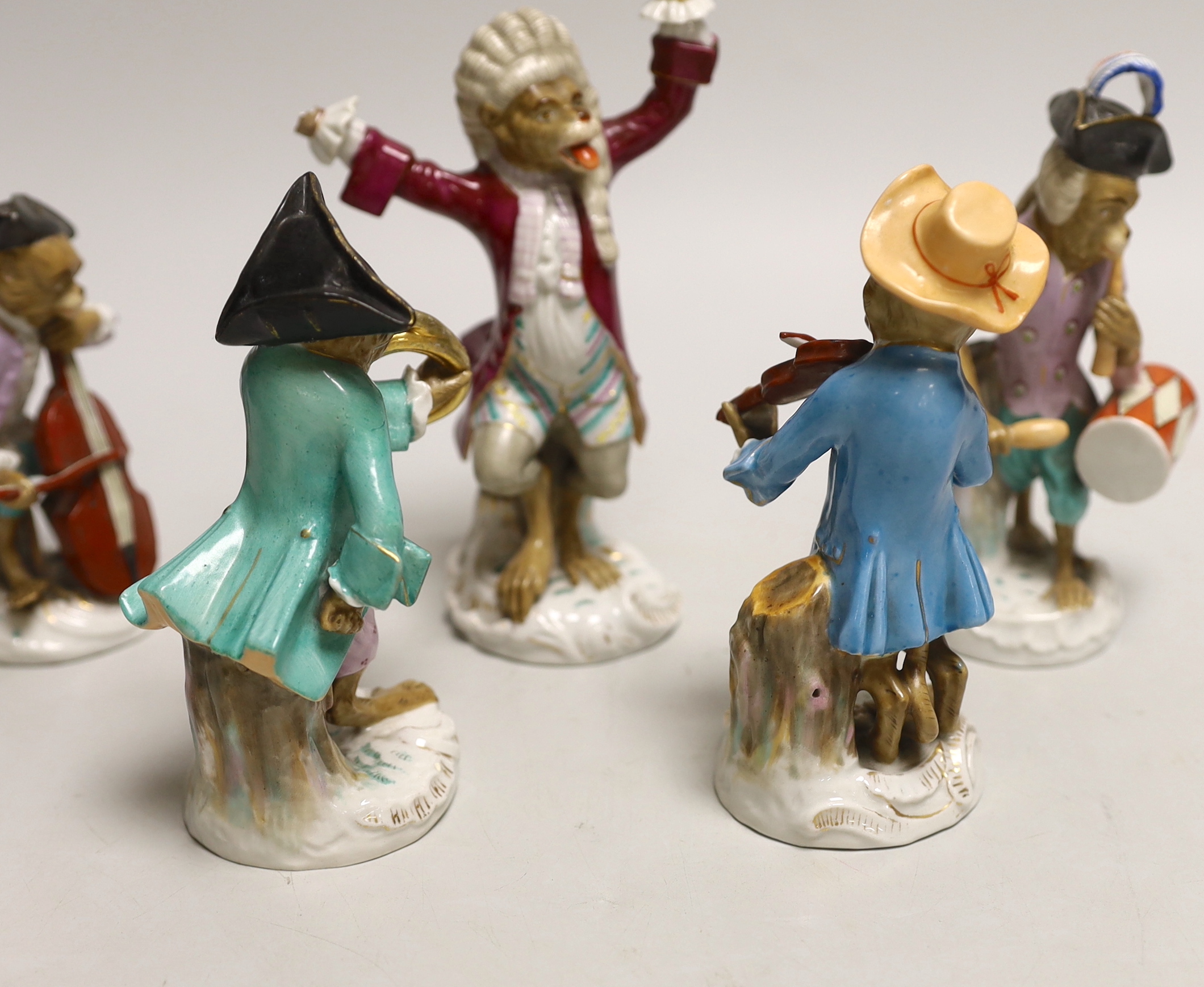 Five Volkstedt porcelain monkey band figures, tallest 17cm